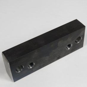 Mellemklods for tipstopventil